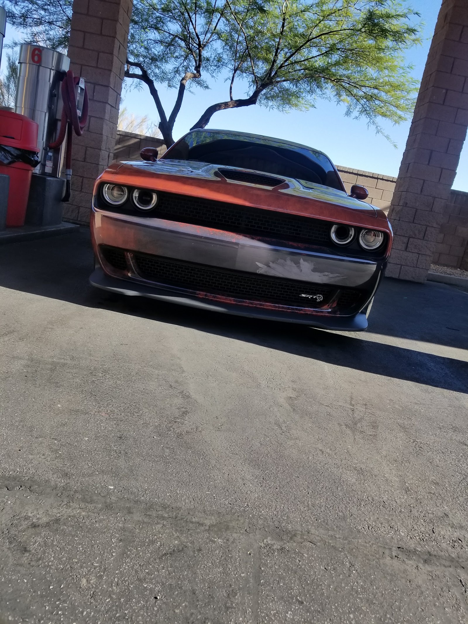 Dodge Challenger SRT Hellcat at self-serve car wash bay