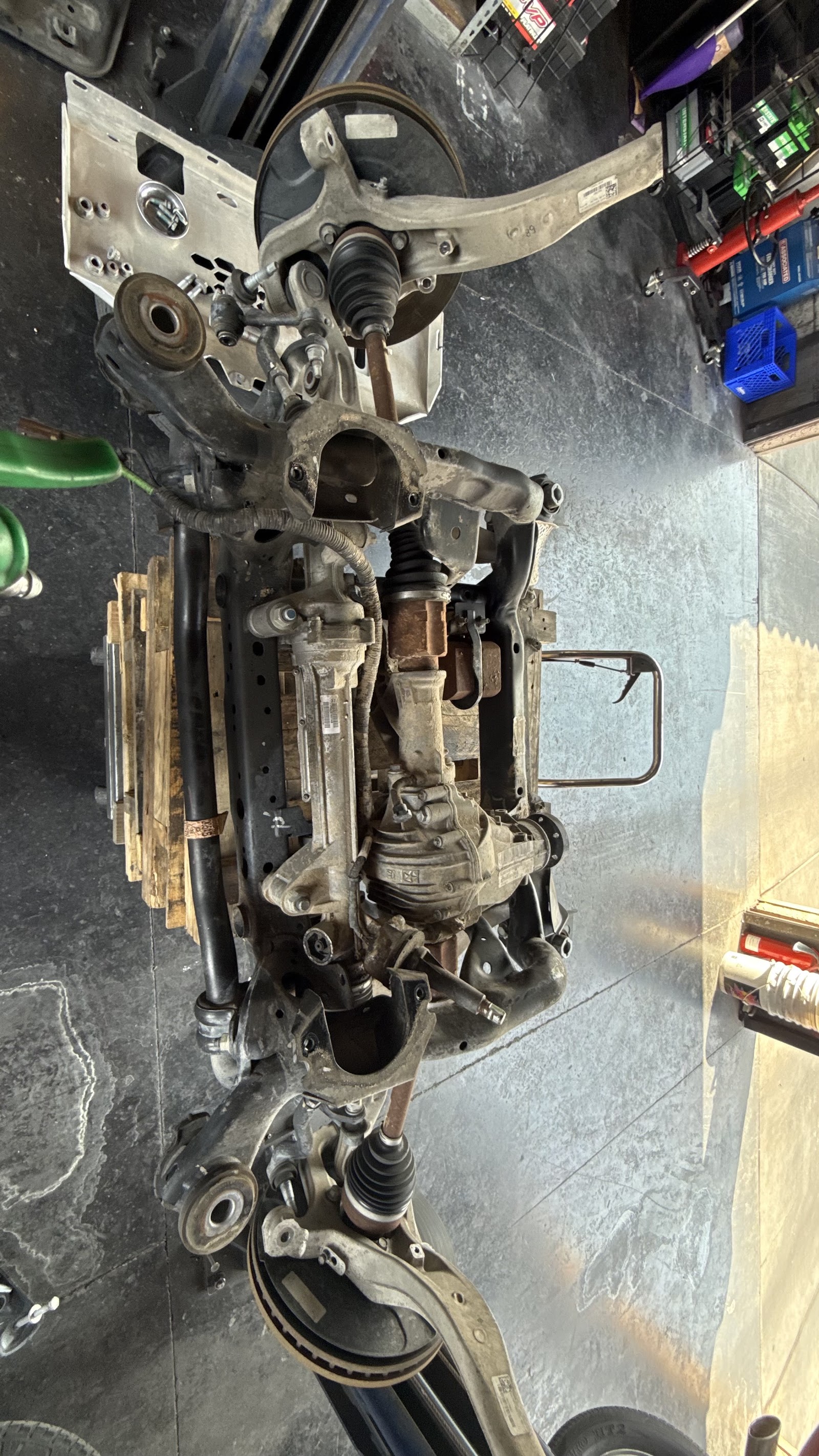 Front subframe with suspension, axles and differential removed from vehicle