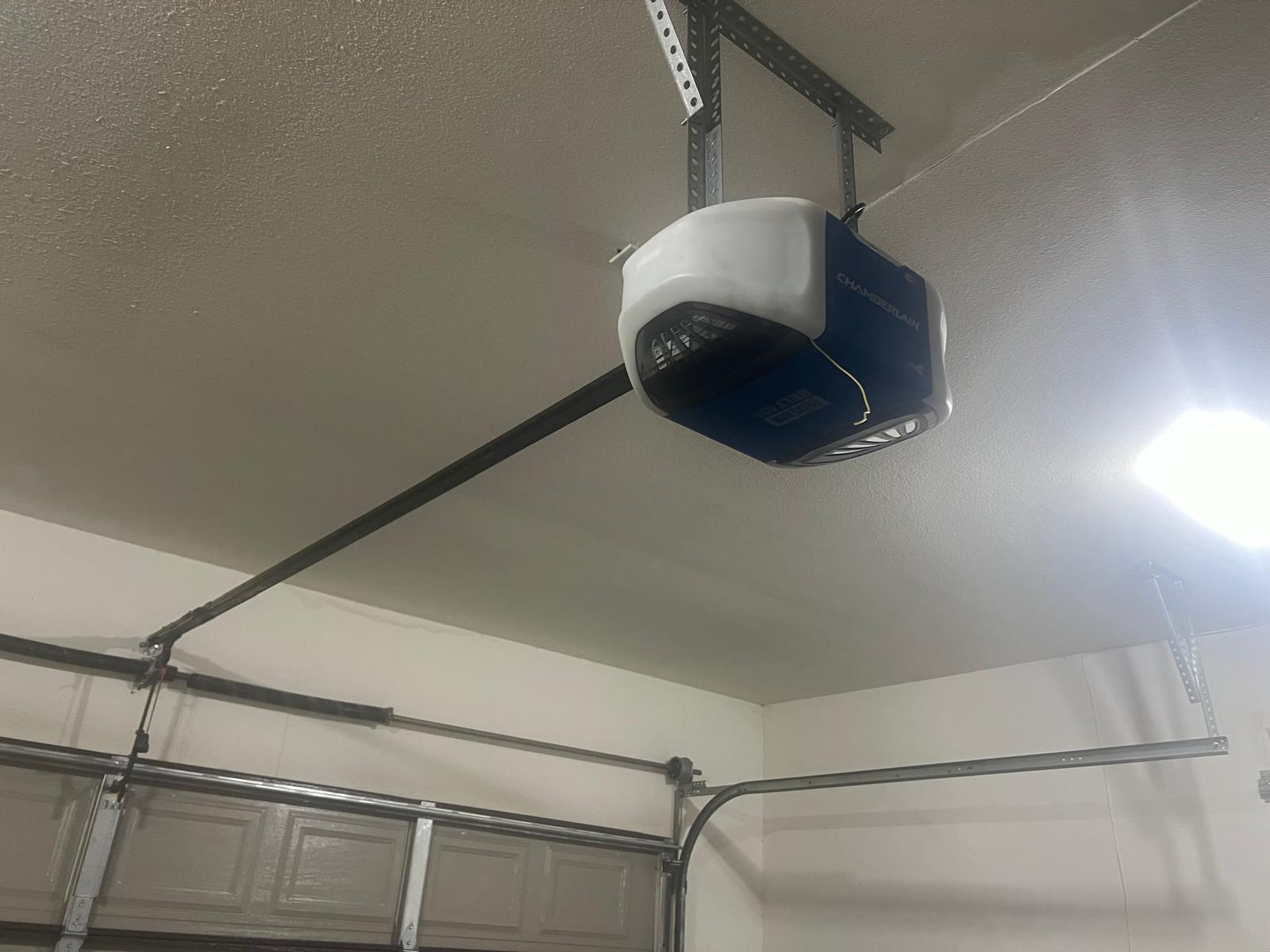 Chamberlain garage door opener mounted to garage ceiling
