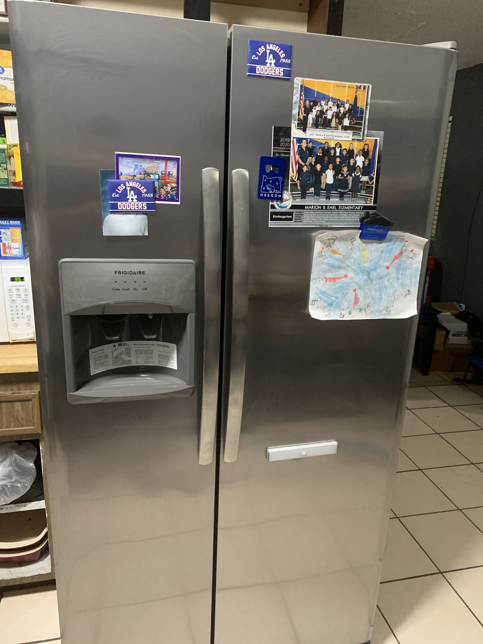 Stainless steel Frigidaire side-by-side refrigerator in kitchen