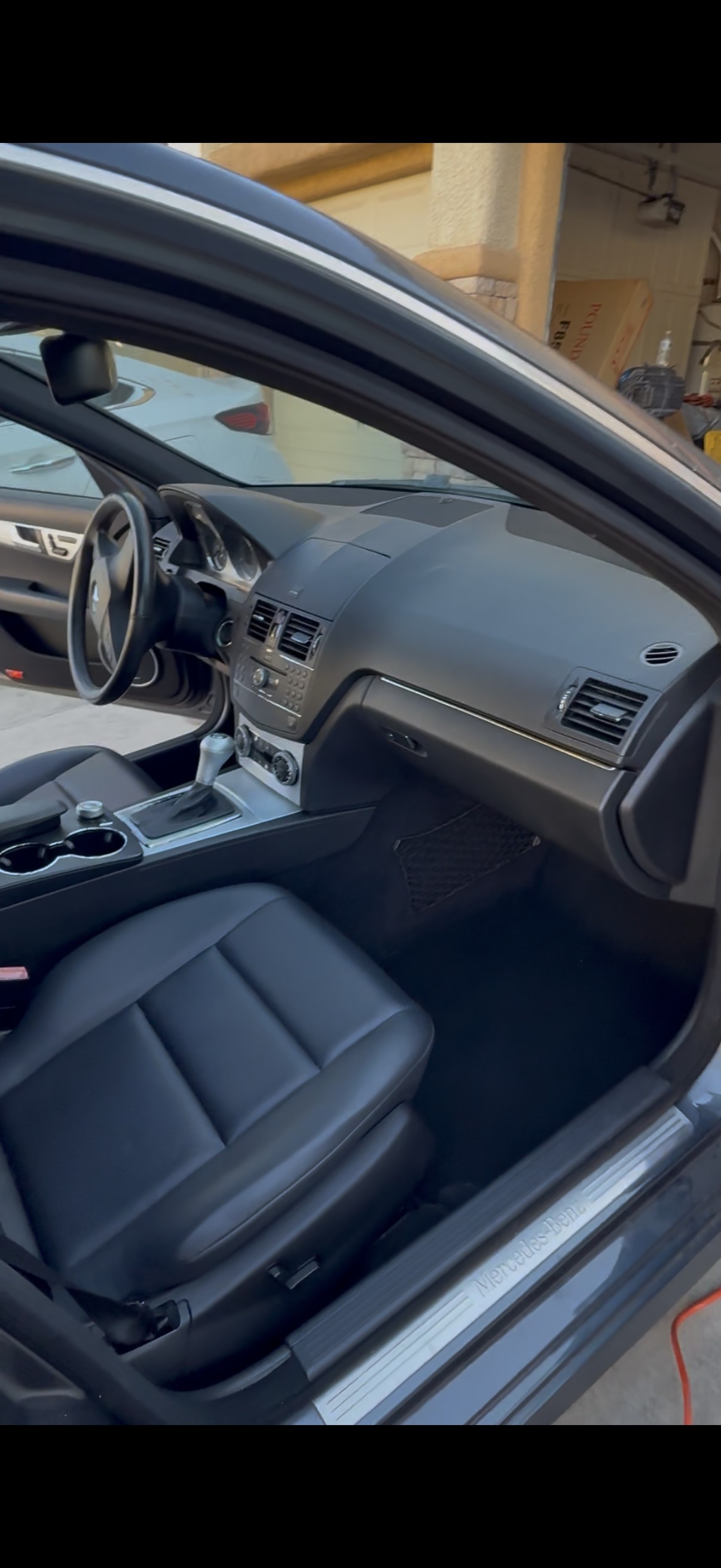 Detailed black leather interior of Mercedes-Benz C-Class